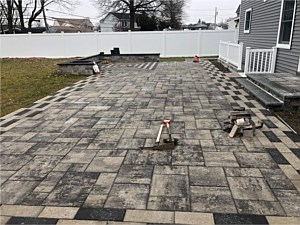 modern gray brick paver patio nicolock granite city alpine smooth pewter raven plank pavers herringbone border design seat wall contemporary modern style